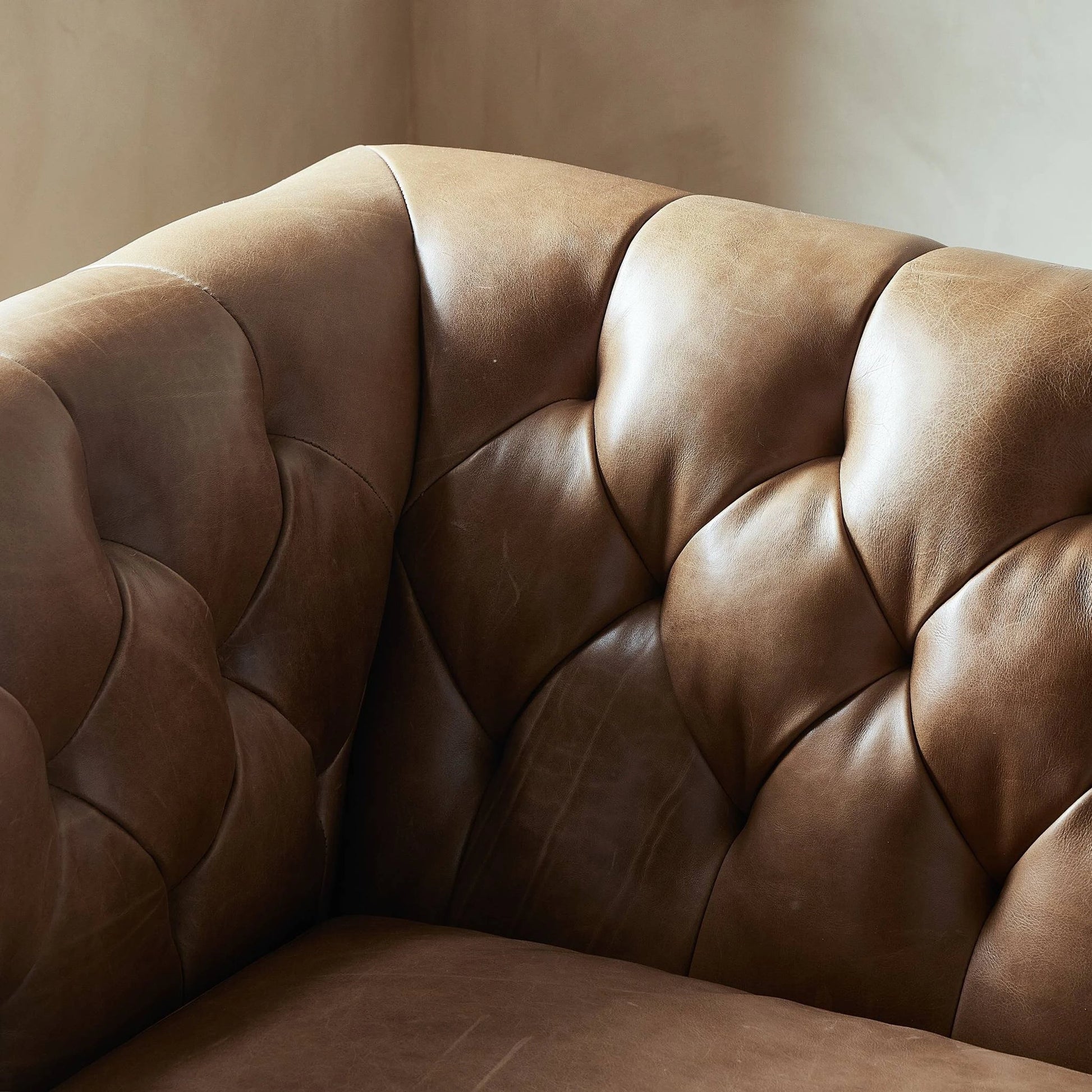 Thurston Sofa by Four Hands in dakota warm taupe and almond. Made from top grain leather, solid parawood, solid poplar in a modern style.