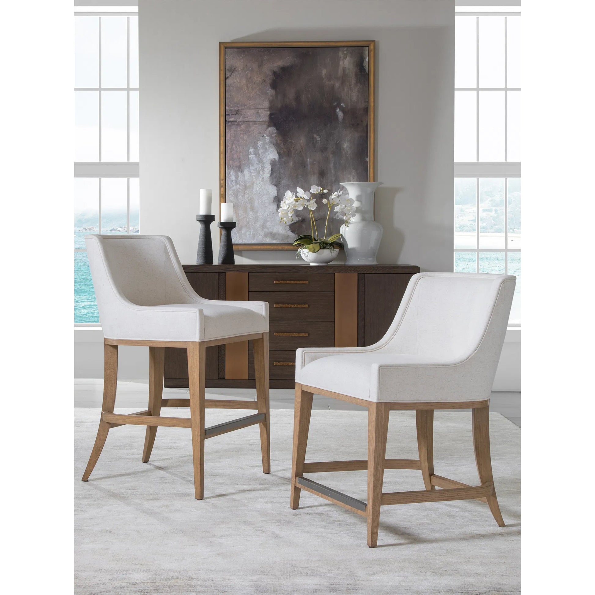 Simpatico Upholstered Counter Stool by Artistica Home in white, ivory and white oak. Made from white oak, fabric in a unique style.