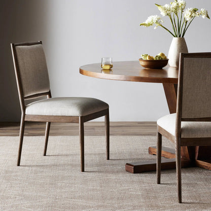 Glenview Dining Chair by Four Hands in essence natural and weathered oak. Made from 49% viscose (rayon), 22% flax, linen, 18% polyester, 11% cotton, solid oak in a modern style.
