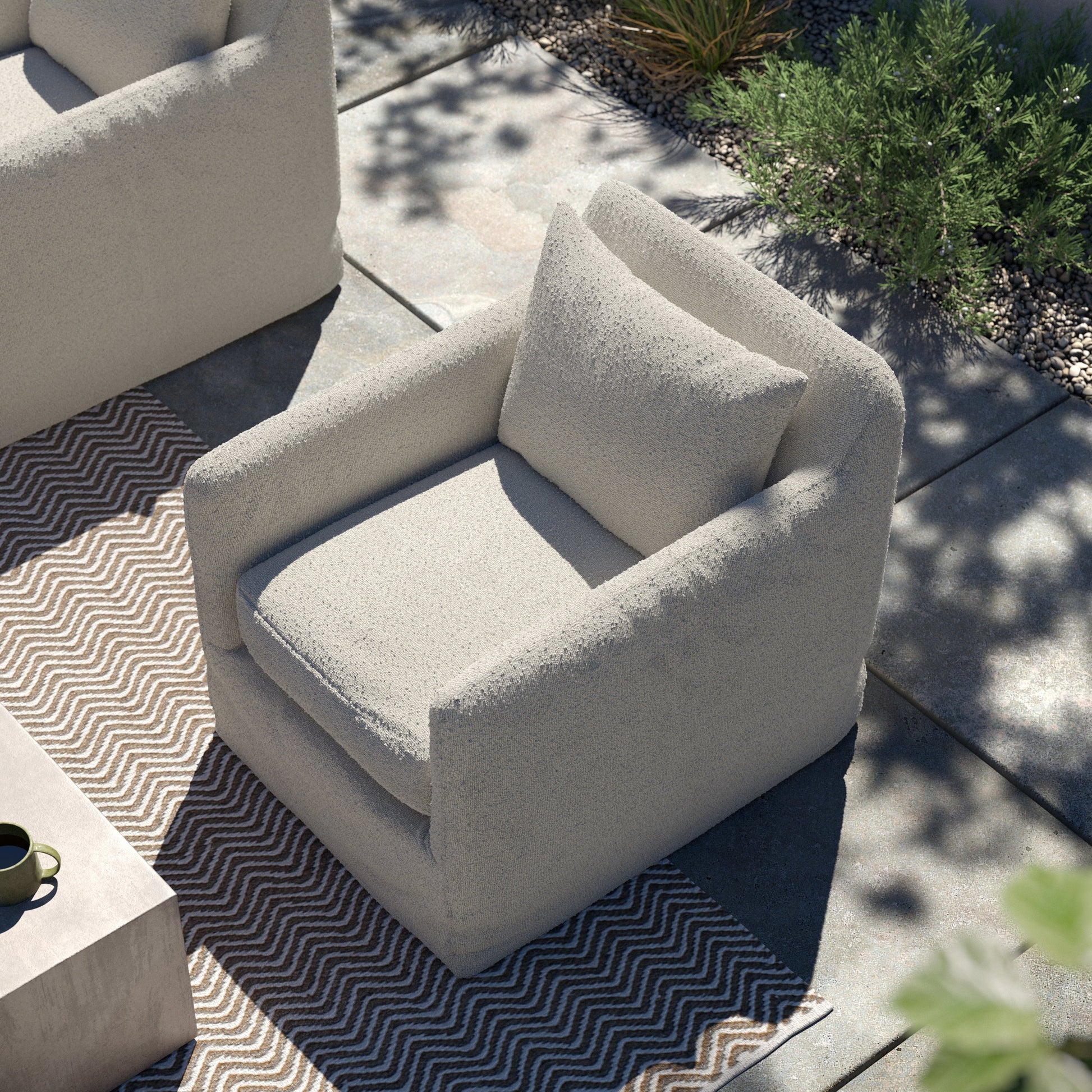 Dade Outdoor Swivel Chair by Four Hands. Made from 100% olefin, aluminum in a modern style.