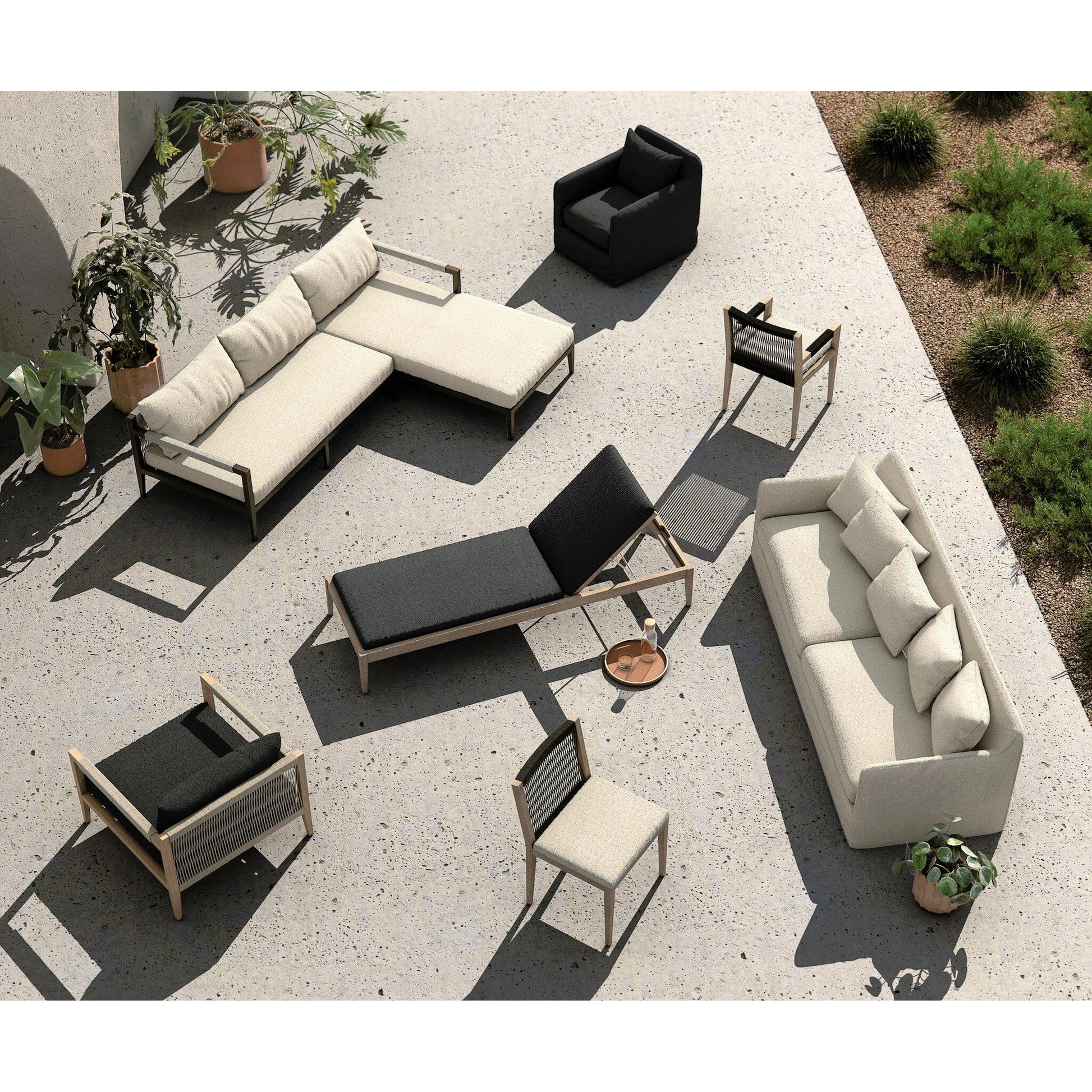 Dade Outdoor Swivel Chair by Four Hands. Made from 100% olefin, aluminum in a modern style.