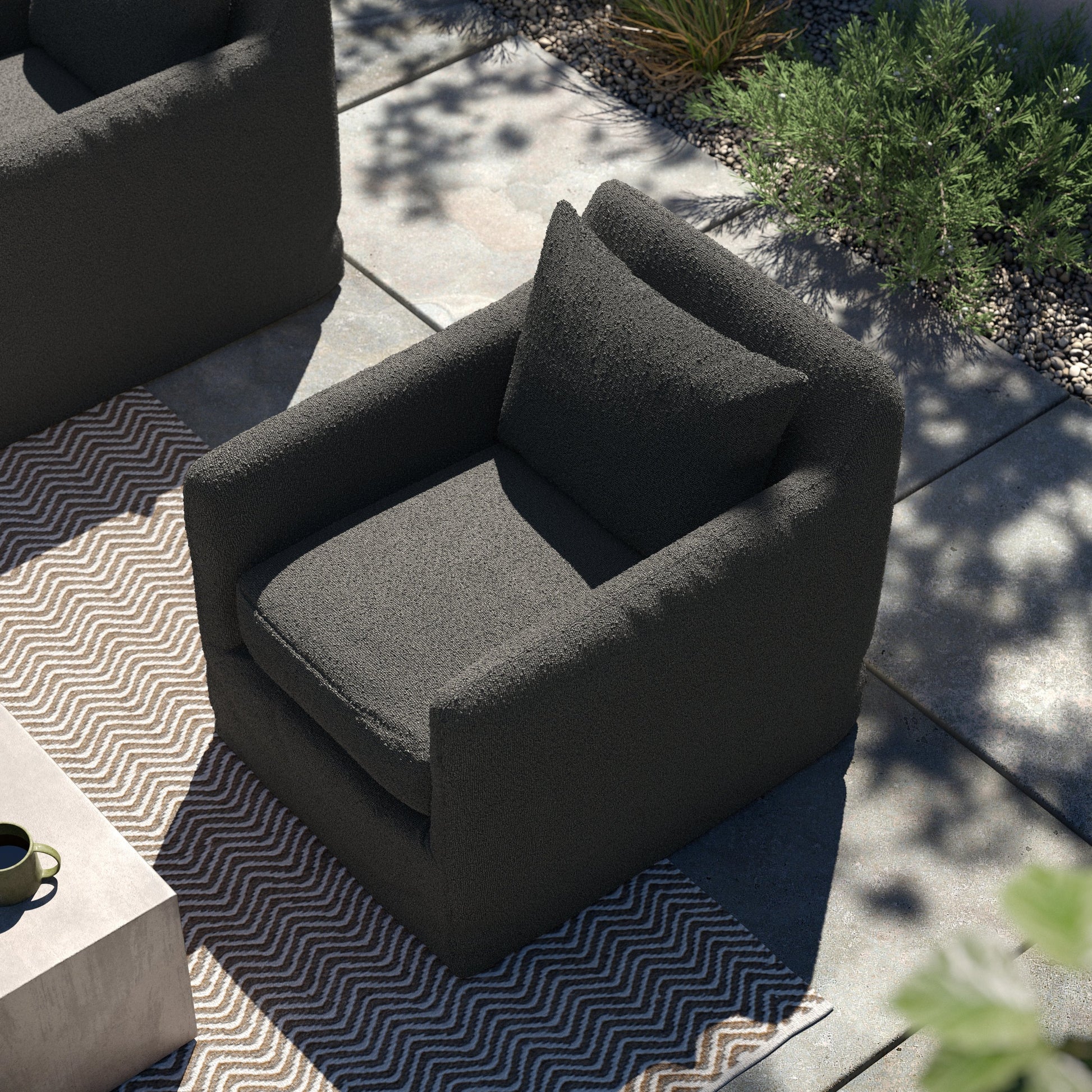 Dade Outdoor Swivel Chair by Four Hands. Made from 100% olefin, aluminum in a modern style.