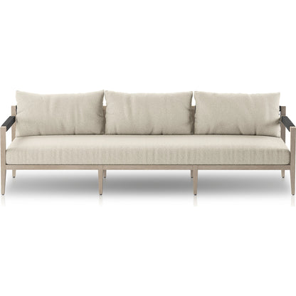 Sherwood Outdoor Sofa, Weathered Grey by Four Hands. Made from 100% olefin, solid fsc®-certified teak, 100% polypropylene in a coastal style.