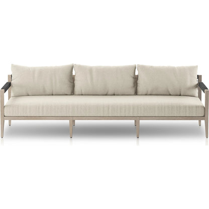 Sherwood Outdoor Sofa, Weathered Grey by Four Hands. Made from 100% olefin, solid fsc®-certified teak, 100% polypropylene in a coastal style.