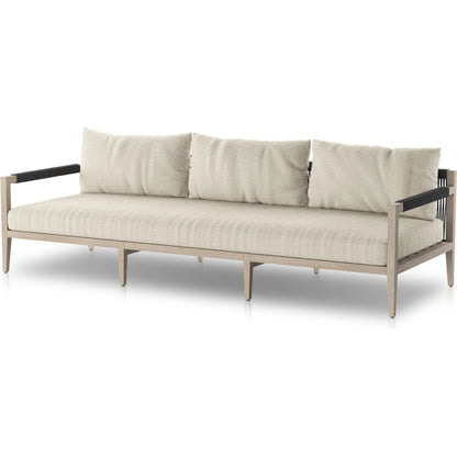 Sherwood Outdoor Sofa, Weathered Grey by Four Hands. Made from 100% olefin, solid fsc®-certified teak, 100% polypropylene in a coastal style.