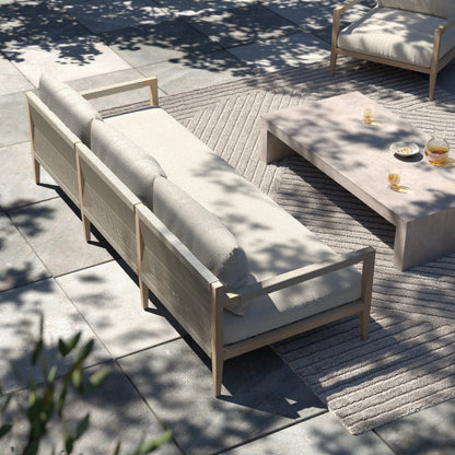 Sherwood Outdoor Sofa, Washed Brown by Four Hands. Made from 100% olefin, solid fsc®-certified teak, 100% polypropylene in a coastal style.