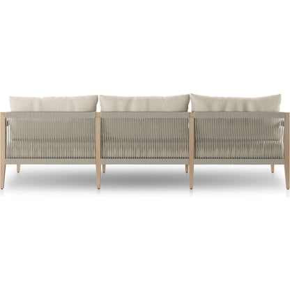 Sherwood Outdoor Sofa, Washed Brown by Four Hands. Made from 100% olefin, solid fsc®-certified teak, 100% polypropylene in a coastal style.