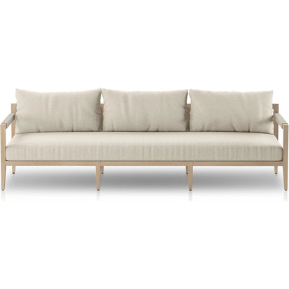 Sherwood Outdoor Sofa, Washed Brown by Four Hands. Made from 100% olefin, solid fsc®-certified teak, 100% polypropylene in a coastal style.