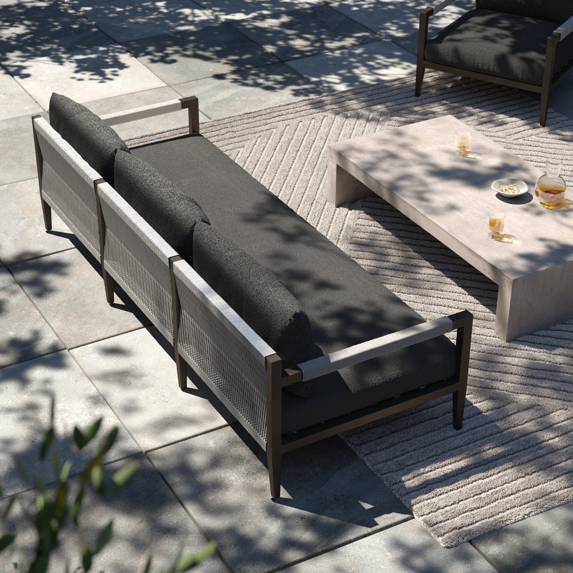 Sherwood Outdoor Sofa, Bronze by Four Hands. Made from 100% olefin, aluminum, 100% polypropylene in a modern style.