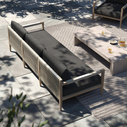 Sherwood Outdoor Sofa, Washed Brown by Four Hands. Made from 100% olefin, solid fsc®-certified teak, 100% polypropylene in a coastal style.