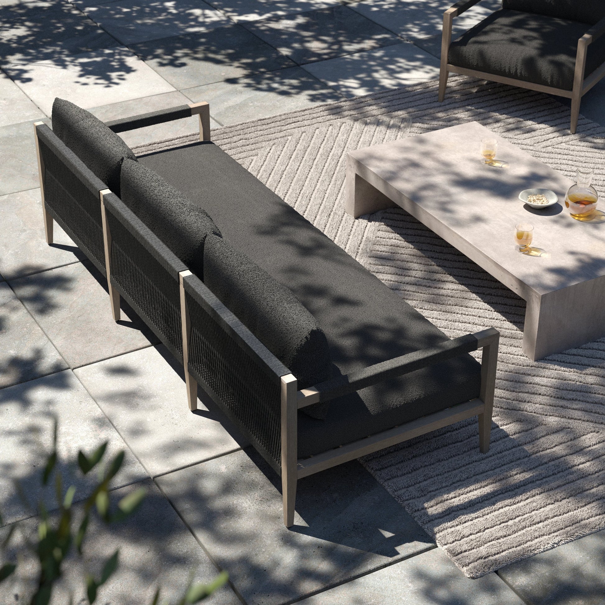 Sherwood Outdoor Sofa, Weathered Grey by Four Hands. Made from 100% olefin, solid fsc®-certified teak, 100% polypropylene in a coastal style.
