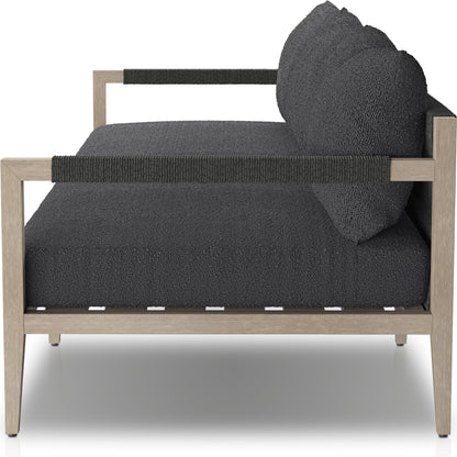 Sherwood Outdoor Sofa, Weathered Grey by Four Hands. Made from 100% olefin, solid fsc®-certified teak, 100% polypropylene in a coastal style.