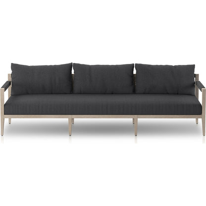 Sherwood Outdoor Sofa, Weathered Grey by Four Hands. Made from 100% olefin, solid fsc®-certified teak, 100% polypropylene in a coastal style.