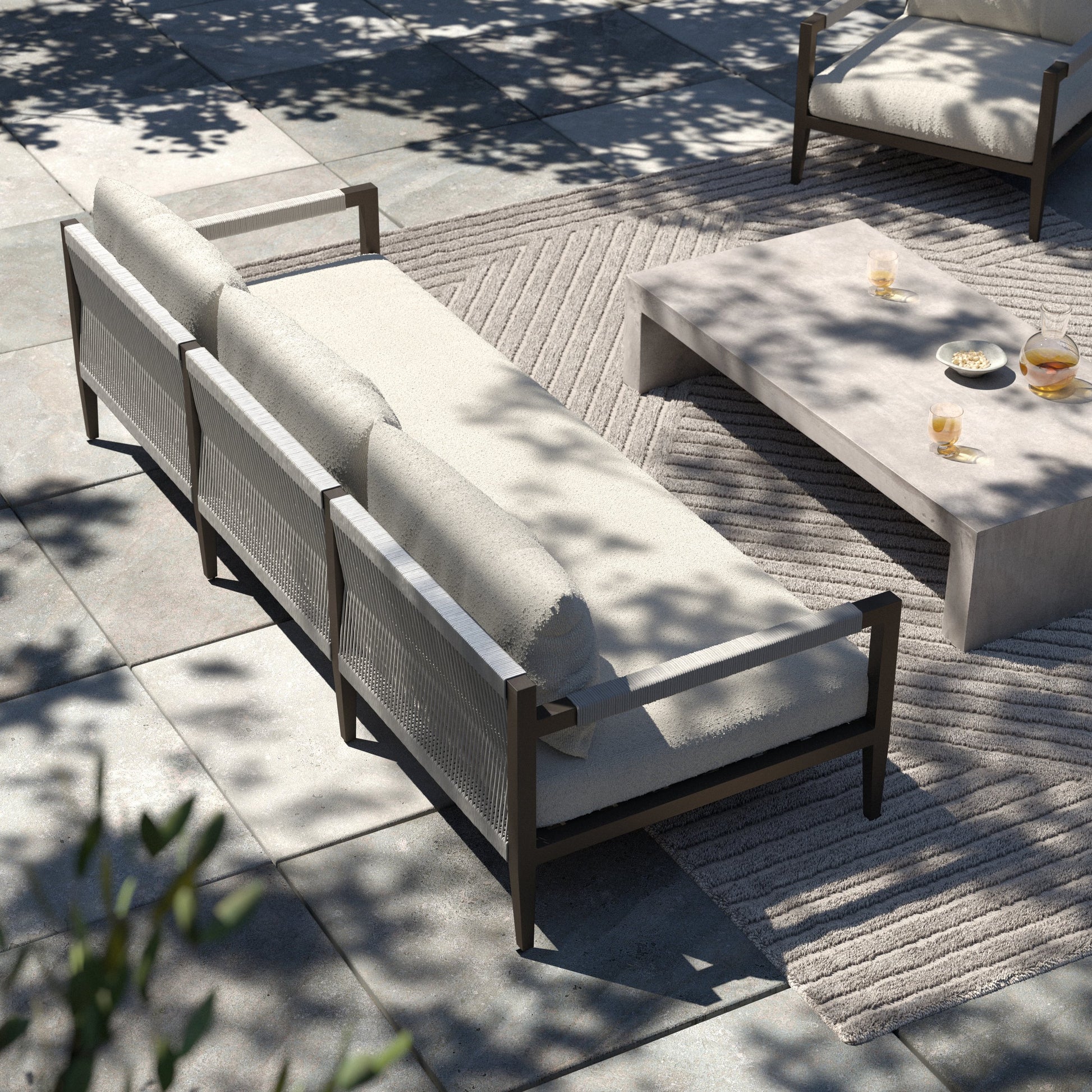Sherwood Outdoor Sofa, Bronze by Four Hands. Made from 100% olefin, aluminum, 100% polypropylene in a modern style.
