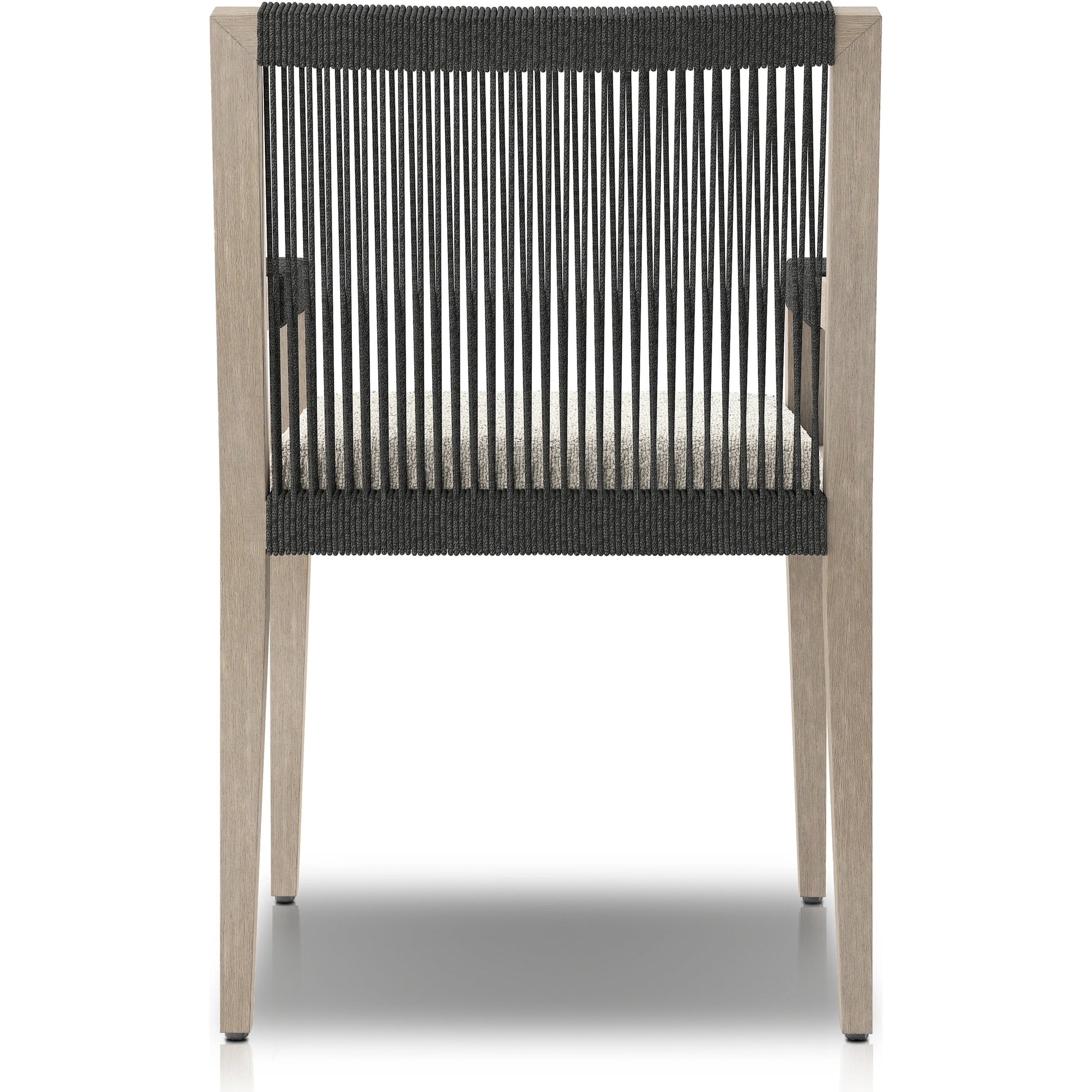 Sherwood Outdoor Dining Armchair, Weathered Grey by Four Hands. Made from 100% olefin, solid fsc®-certified teak, 100% polypropylene in a coastal style.