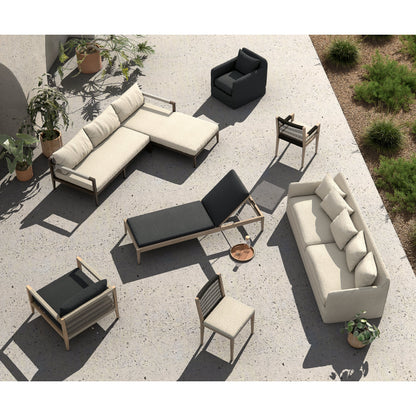 Sherwood Outdoor Dining Armchair, Weathered Grey by Four Hands. Made from 100% olefin, solid fsc®-certified teak, 100% polypropylene in a coastal style.