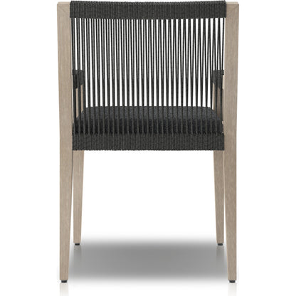 Sherwood Outdoor Dining Armchair, Weathered Grey by Four Hands. Made from 100% olefin, solid fsc®-certified teak, 100% polypropylene in a coastal style.