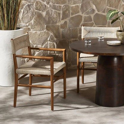 Lomas Outdoor Dining Armchair by Four Hands. Made from solid teak, 100% polyethylene in a modern style.