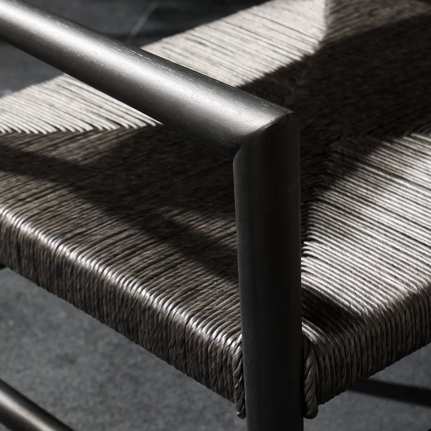 024 SI-2092619 | Closeup | Lomas Outdoor Dining Armchair by Four Hands. Made from solid teak, 100% polyethylene in a modern style.