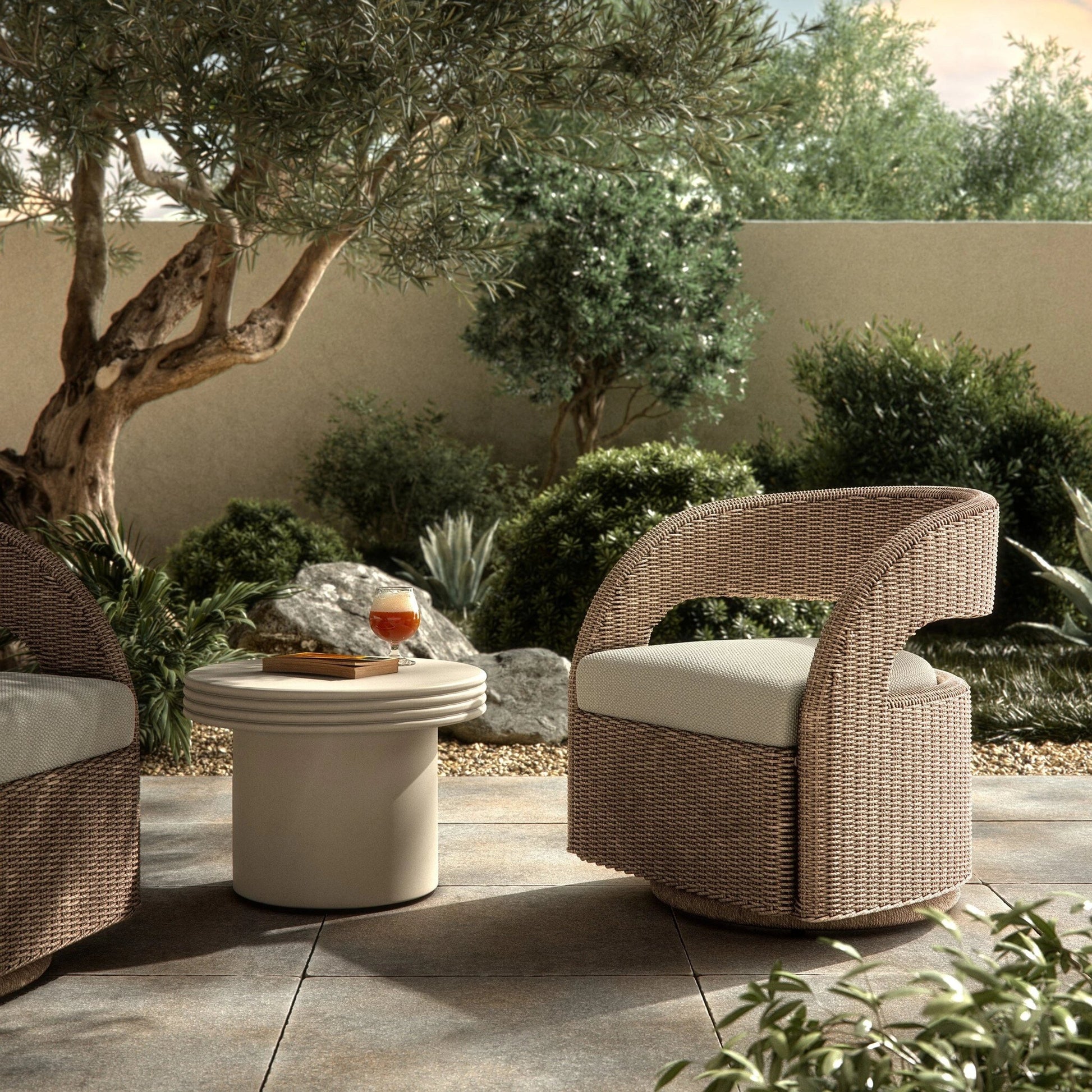 Hawkins Outdoor Swivel Chair by Four Hands. Made from 100% olefin, 100% polyethylene, 91% polyurethane foam pad, 9% polyester fiber batting in a modern style.