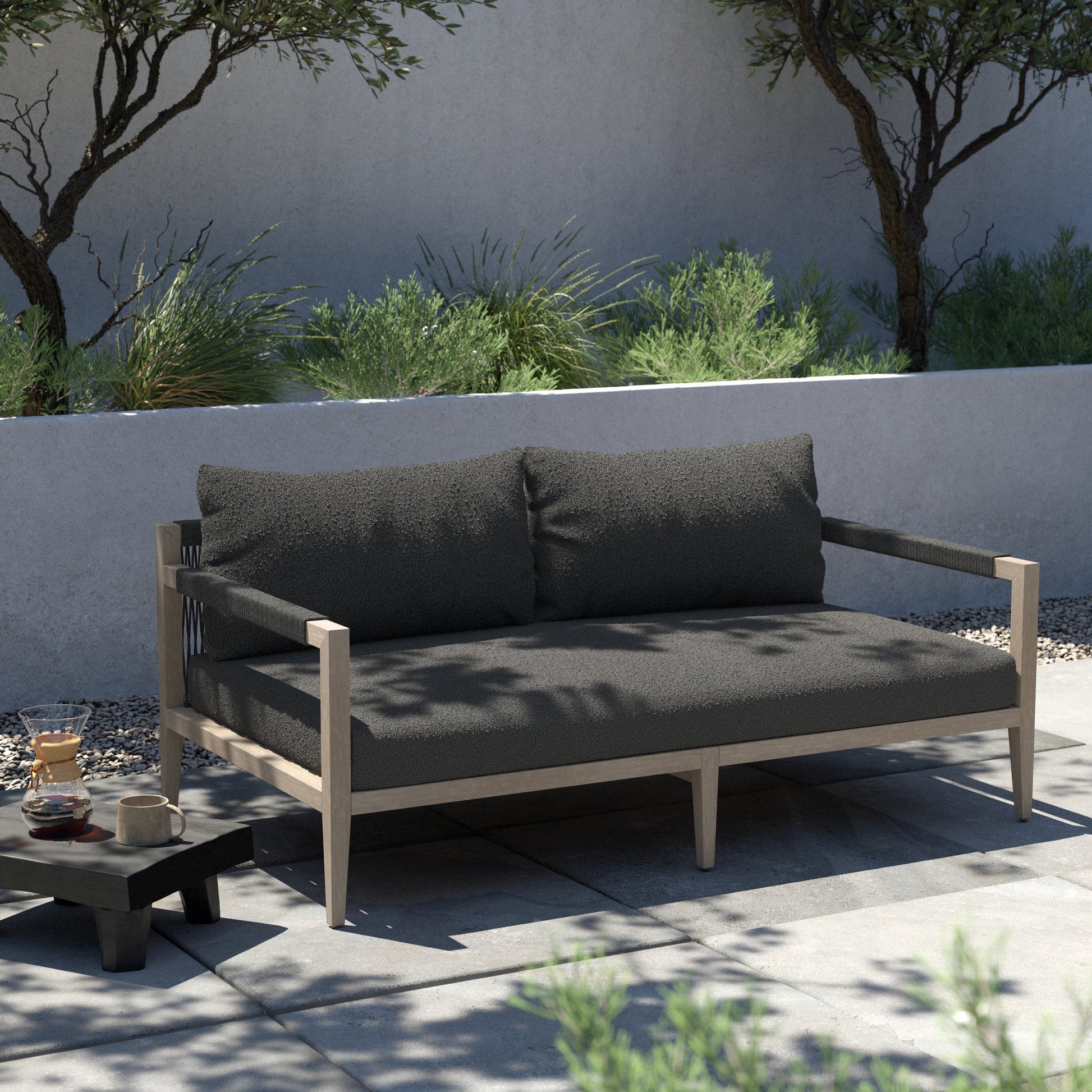 Sherwood Outdoor Sofa, Weathered Grey by Four Hands. Made from 100% olefin, solid fsc®-certified teak, 100% polypropylene in a coastal style.