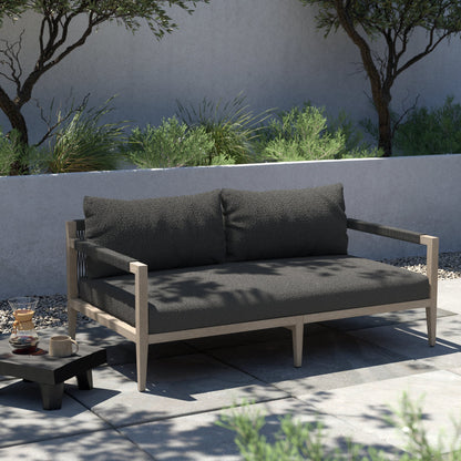 Sherwood Outdoor Sofa, Weathered Grey by Four Hands. Made from 100% olefin, solid fsc®-certified teak, 100% polypropylene in a coastal style.