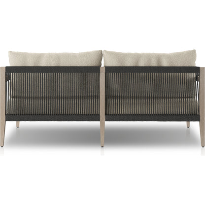 Sherwood Outdoor Sofa, Weathered Grey by Four Hands. Made from 100% olefin, solid fsc®-certified teak, 100% polypropylene in a coastal style.