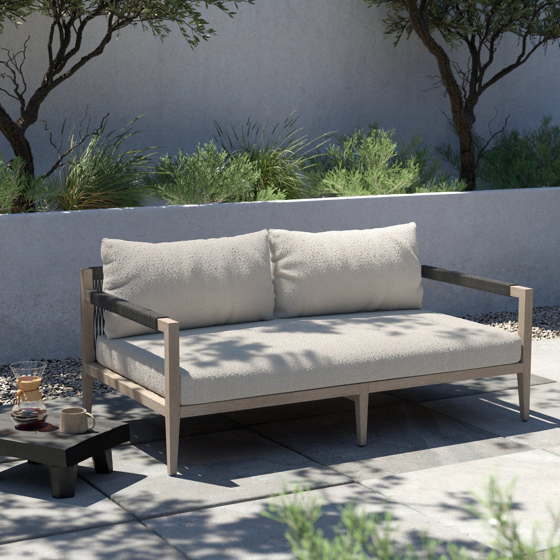 Sherwood Outdoor Sofa, Weathered Grey by Four Hands. Made from 100% olefin, solid fsc®-certified teak, 100% polypropylene in a coastal style.