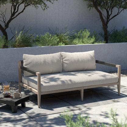 Sherwood Outdoor Sofa, Weathered Grey by Four Hands. Made from 100% olefin, solid fsc®-certified teak, 100% polypropylene in a coastal style.