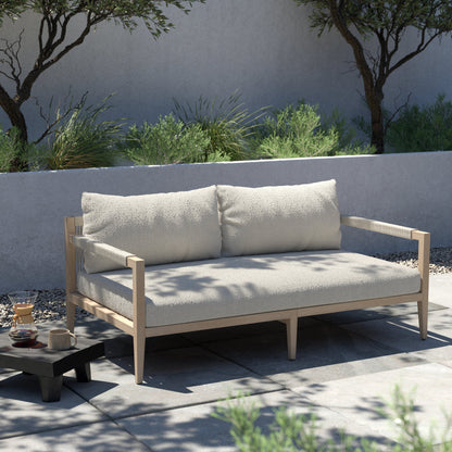 Sherwood Outdoor Sofa, Washed Brown by Four Hands. Made from 100% olefin, solid fsc®-certified teak, 100% polypropylene in a coastal style.