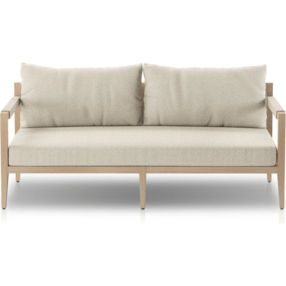 Sherwood Outdoor Sofa, Washed Brown by Four Hands. Made from 100% olefin, solid fsc®-certified teak, 100% polypropylene in a coastal style.