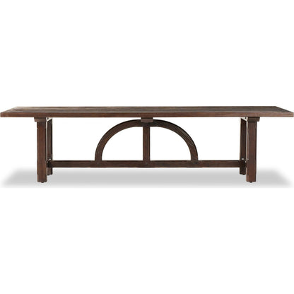 The Arch Dining Table by Four Hands in medium brown fir. Made from thick pine veneer, solid pine, engineered hardwood in a modern style.