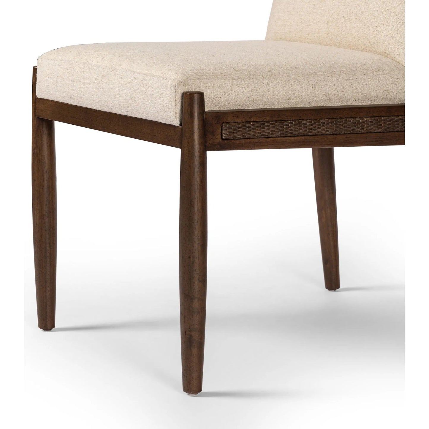 012 SI-2257090 | Closeup | Costera Dining Chair by Four Hands in antwerp natural, almond, vintage cross woven cane. Made from 39% linen, 35% cotton, 26% polyester, solid parawood, cane in a transitional style.
