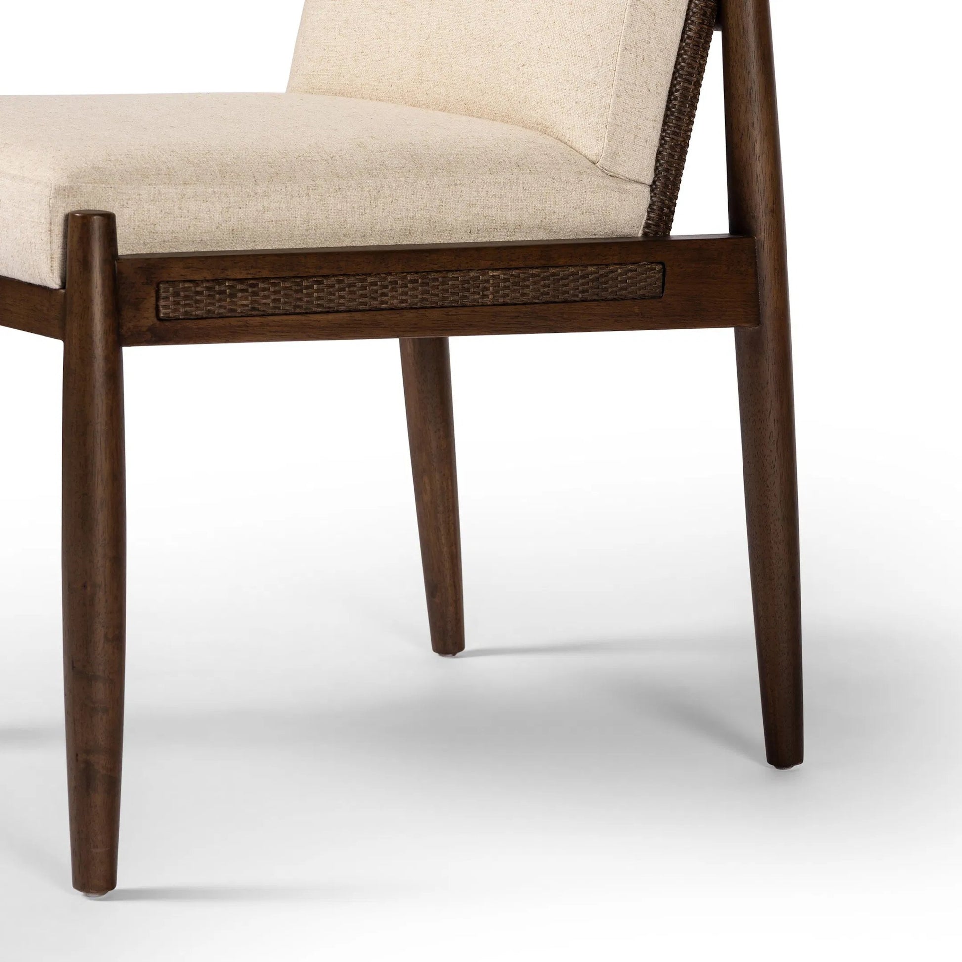 Costera Dining Chair by Four Hands in antwerp natural, almond, vintage cross woven cane. Made from 39% linen, 35% cotton, 26% polyester, solid parawood, cane in a transitional style.