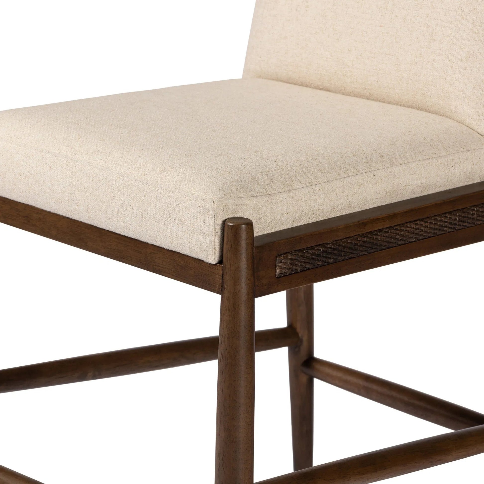 Costera Counter Stool by Four Hands in antwerp natural, almond, vintage cross woven cane. Made from 39% linen, 35% cotton, 26% polyester, solid parawood, cane in a transitional style.