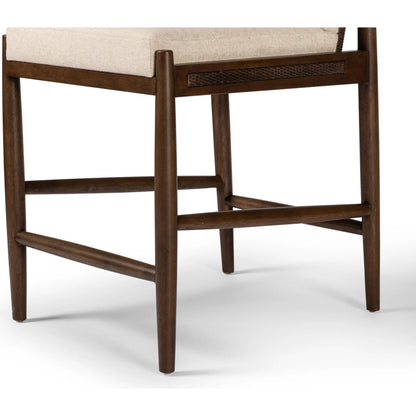 Costera Counter Stool by Four Hands in antwerp natural, almond, vintage cross woven cane. Made from 39% linen, 35% cotton, 26% polyester, solid parawood, cane in a transitional style.