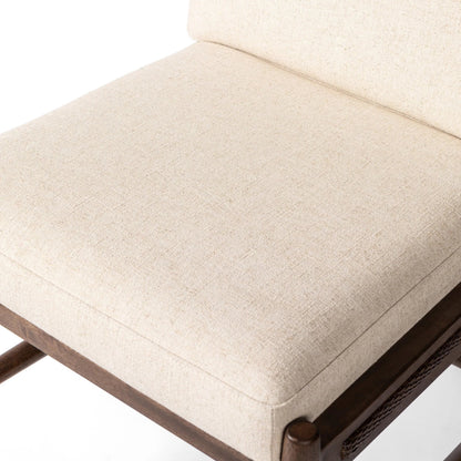 Costera Counter Stool by Four Hands in antwerp natural, almond, vintage cross woven cane. Made from 39% linen, 35% cotton, 26% polyester, solid parawood, cane in a transitional style.