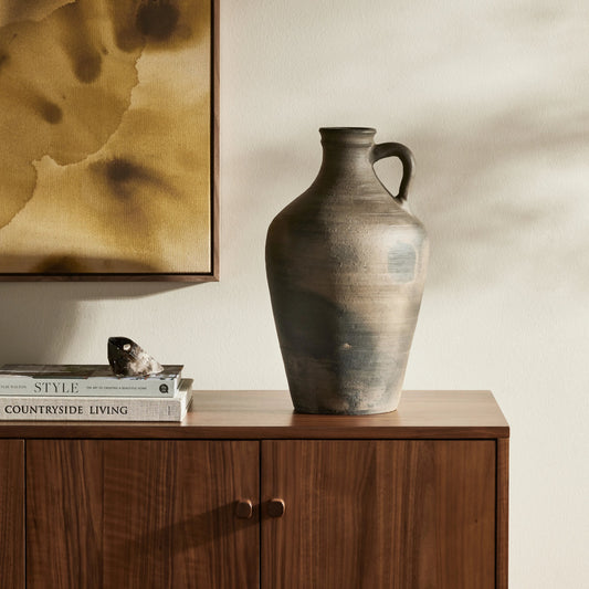Kamari Vase by Four Hands in aged black ceramic. Made from terracotta in a unique style.