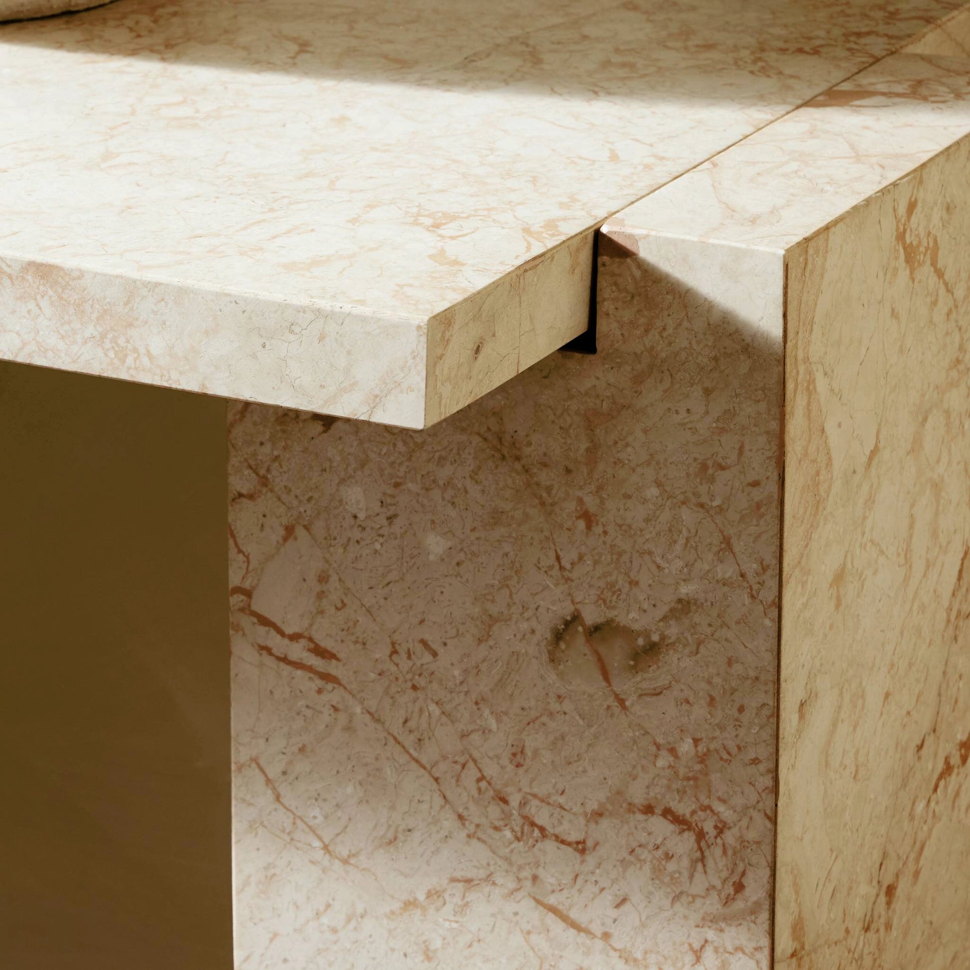 Romano Console Table by Four Hands in desert taupe marble. Made from solid marble in a modern style.