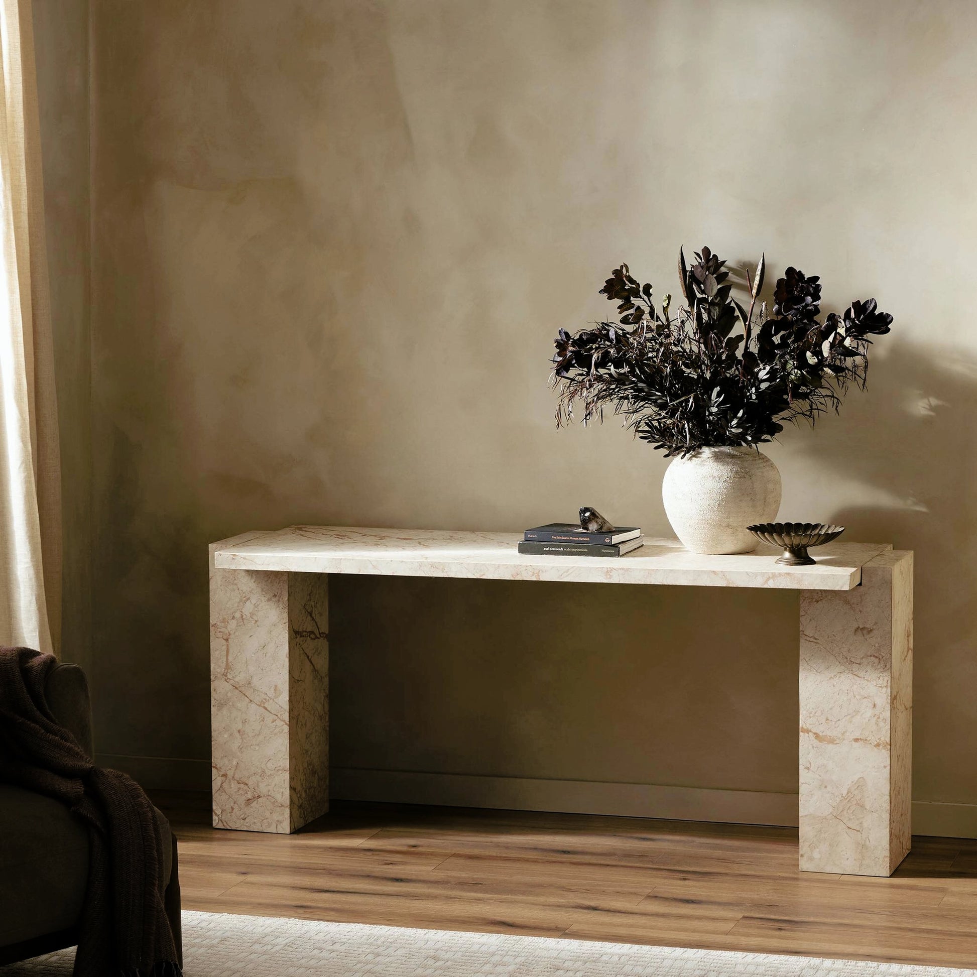 Romano Console Table by Four Hands in desert taupe marble. Made from solid marble in a modern style.