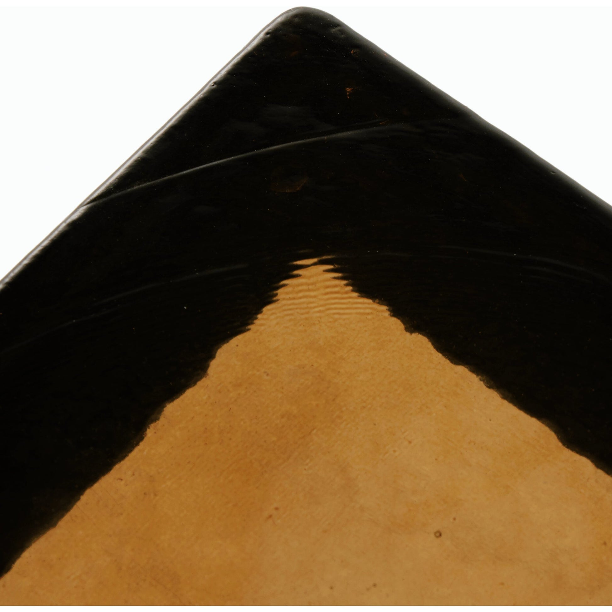 Giselle End Table by Four Hands in matte black, amber. Made from cast glass, iron in a modern style.