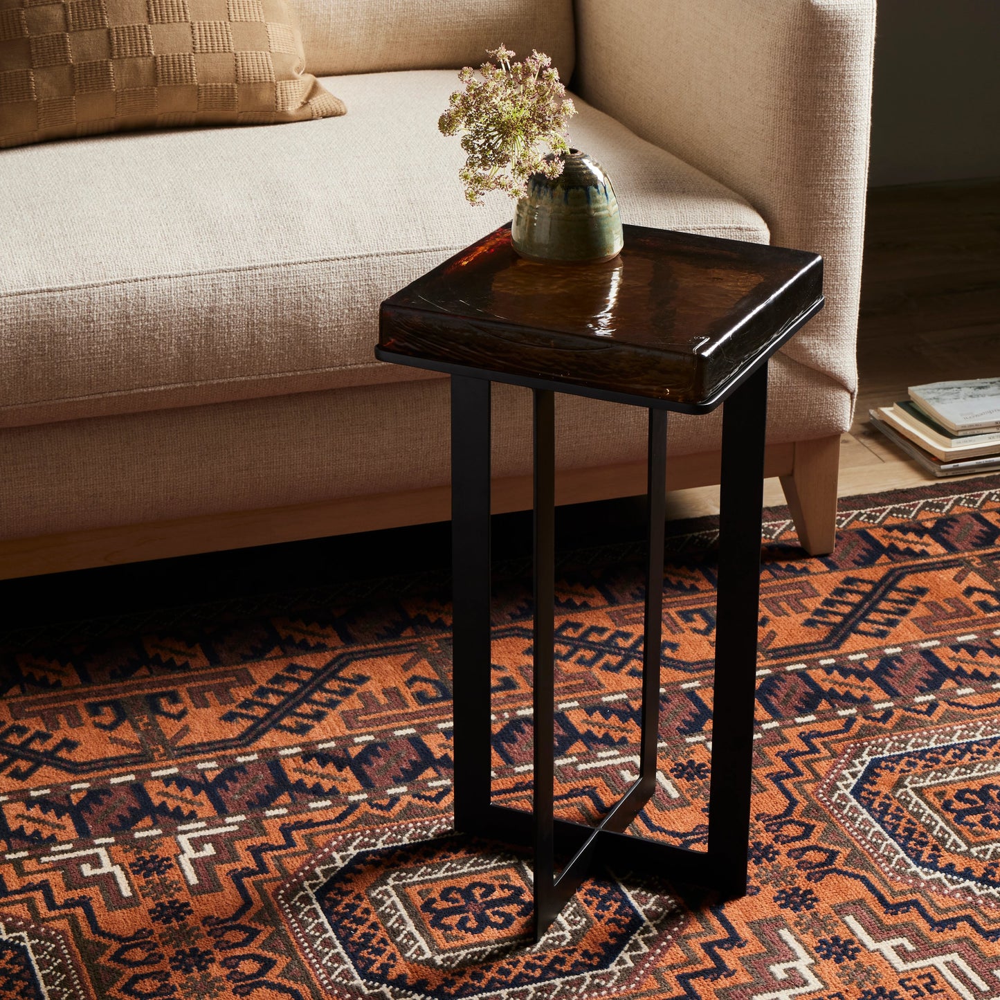 004 SI-2074325 | Lifestyle | Giselle End Table by Four Hands in matte black, amber. Made from cast glass, iron in a modern style.
