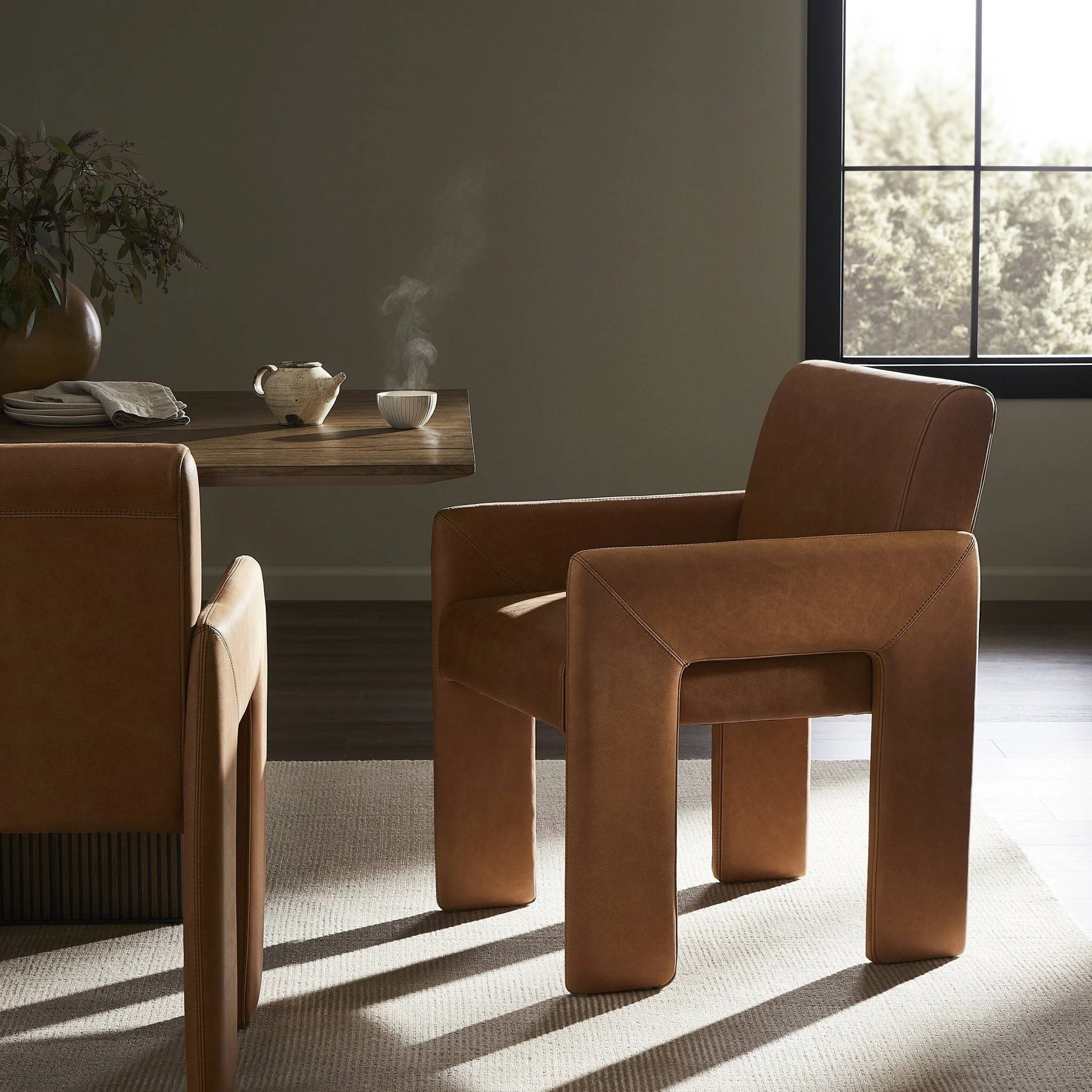 Amur Dining Armchair by Four Hands. Made from unique in a modern style.