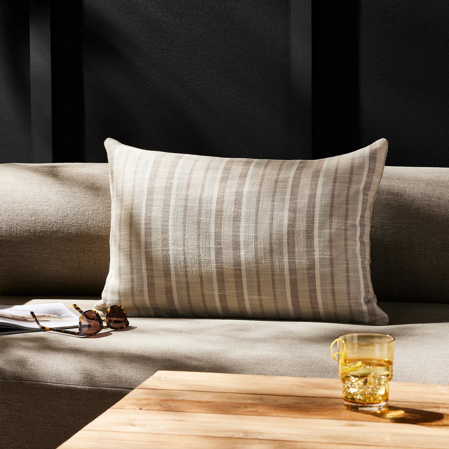 007 SI-2074039 | Lifestyle | Adobe Stripe Outdoor Pillow by Four Hands in adobe stripe. Made from 89.28% poly (uv), 10.72% pcrpoly, down alternative fiber, 100% polyester in a unique style.