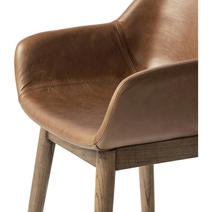 Hannah Swivel Counter Stool by Four Hands. Made from unique in a traditional style.
