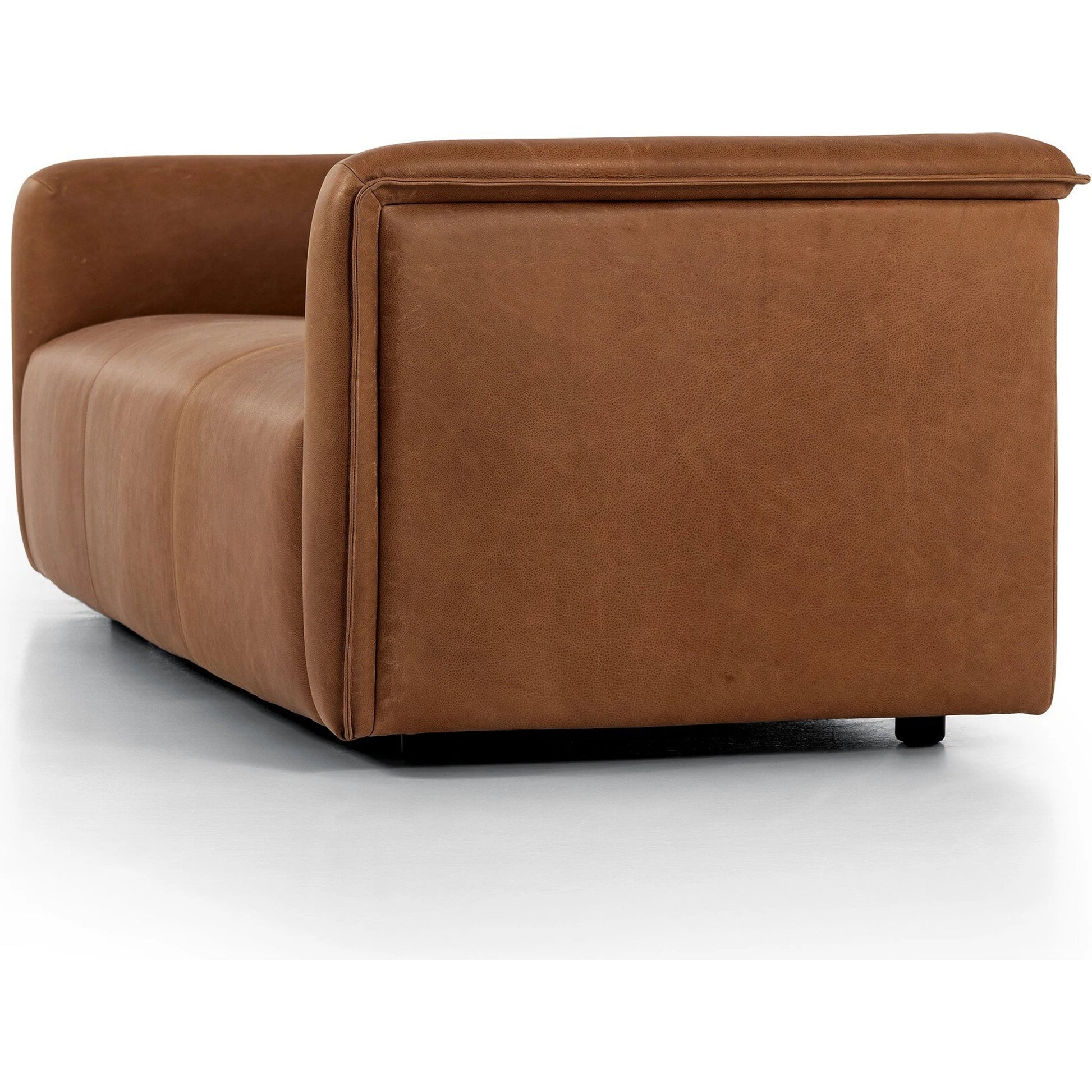 Wellborn Sofa by Four Hands in palermo cognac. Made from top grain leather, poplar plywood, 100% polyester in a modern style.