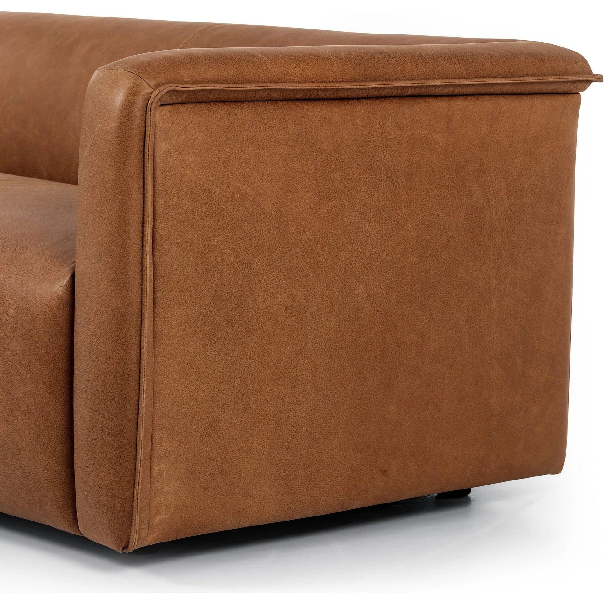 Wellborn Sofa by Four Hands in palermo cognac. Made from top grain leather, poplar plywood, 100% polyester in a modern style.