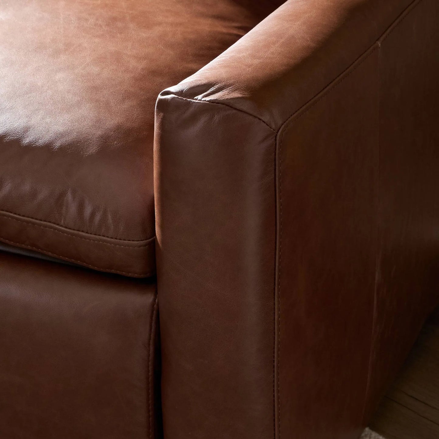 018 SI-2519324 | Closeup | Tillery Power Recliner Accent Chair by Four Hands in sonoma coco. Made from top grain leather in a traditional style.
