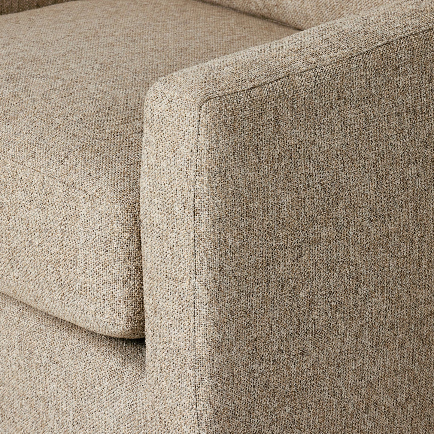 015 SI-2001432 | Closeup | Hampton Swivel Chair by Four Hands in delta sand. Made from 97.42% olefin 2.58% polyester, pine plywood, 100% polyester in a modern style.
