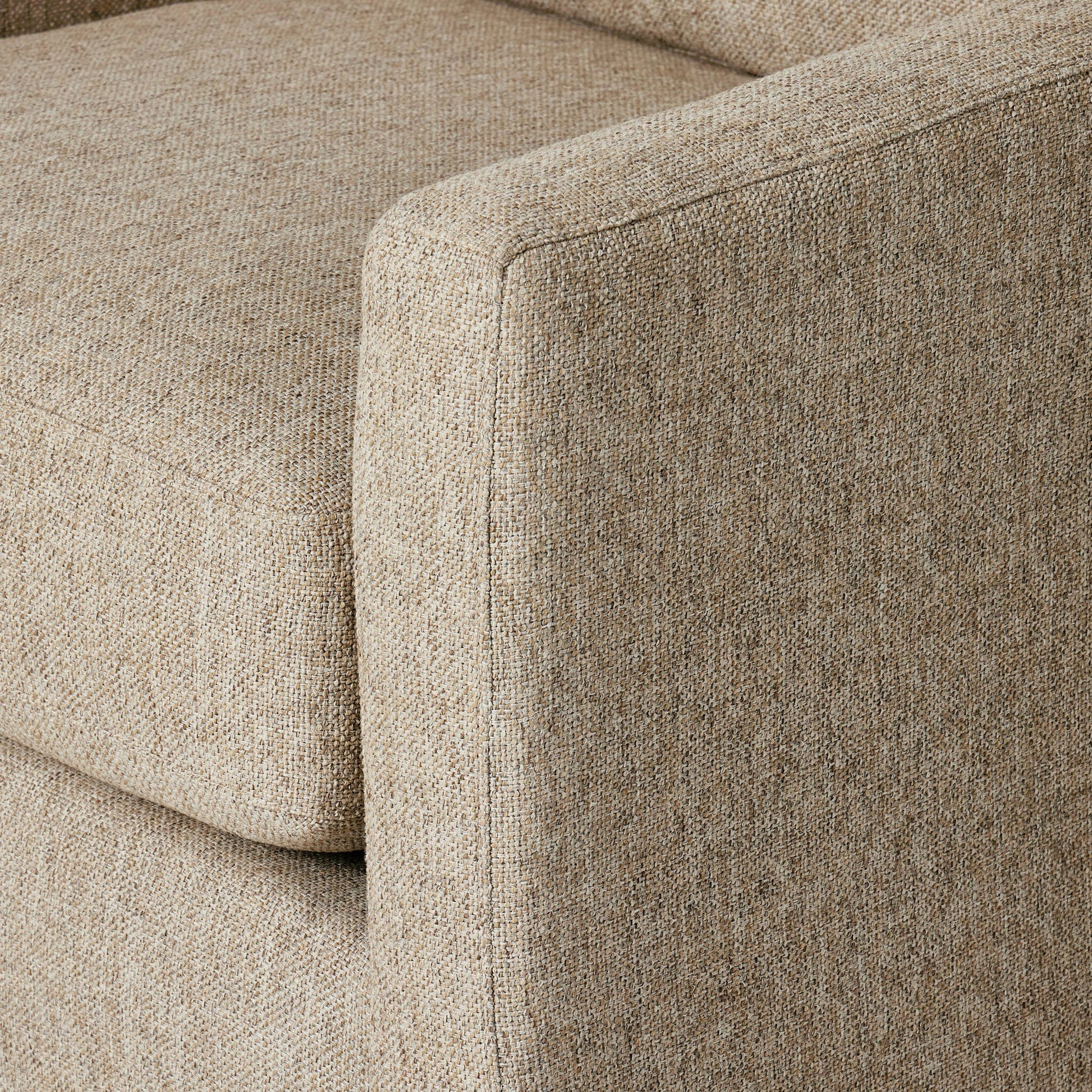Hampton Swivel Chair by Four Hands in delta sand. Made from 97.42% olefin 2.58% polyester, pine plywood, 100% polyester in a modern style.